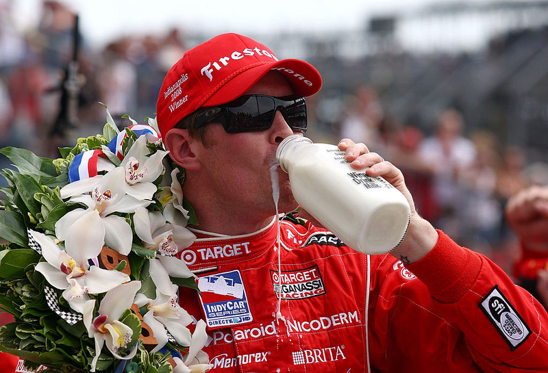 Scott Dixon, winner of the 92nd running of the Indy 500 in 2008, chugs a bottle of the good stuff. Photo credit Getty Images